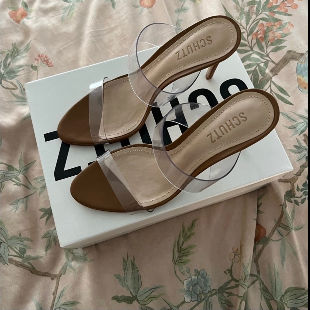 New! Schutz Ariella sandal with clear vinyl straps and a stiletto heel.